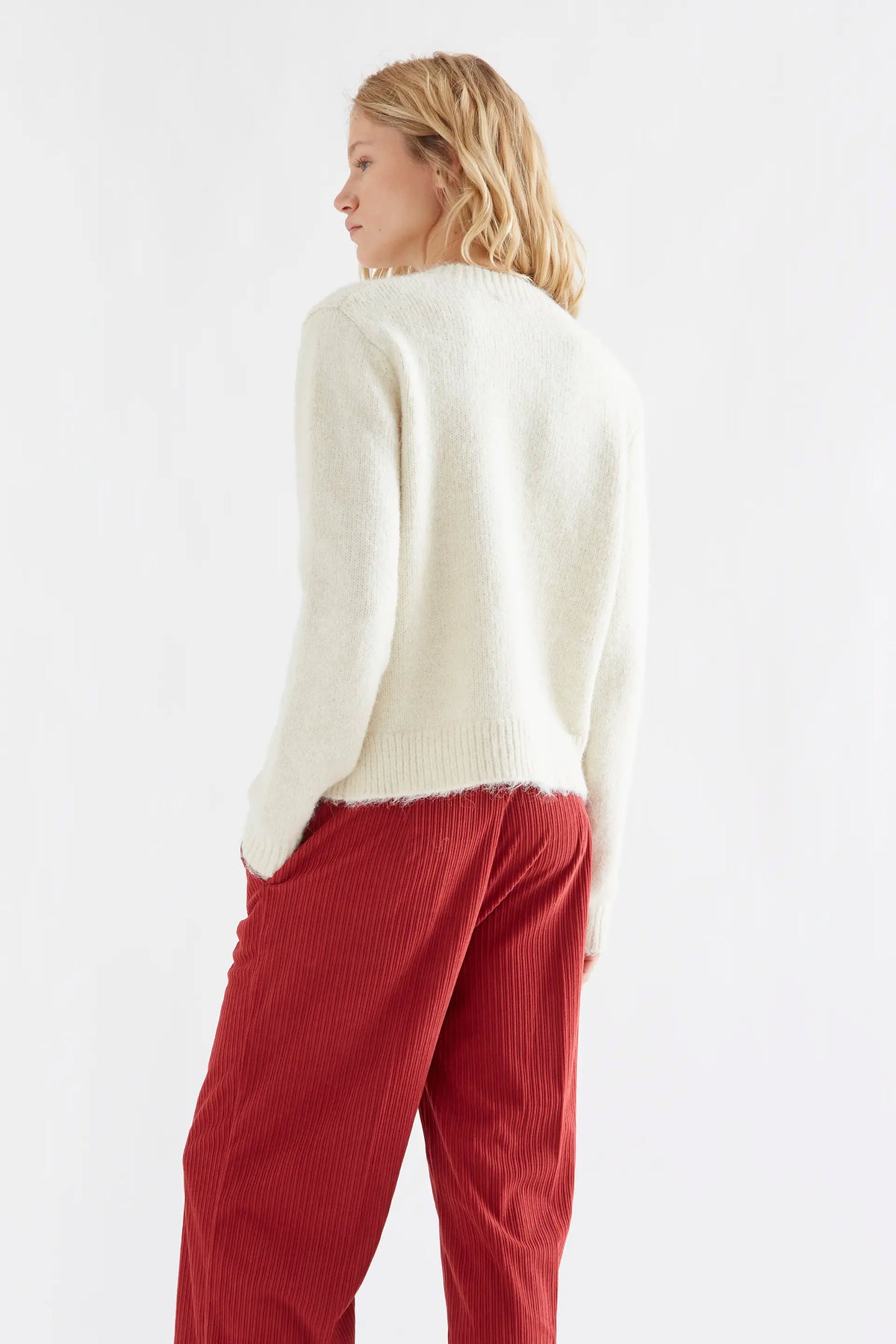 Ecru knit cardigan with multicolored buttons