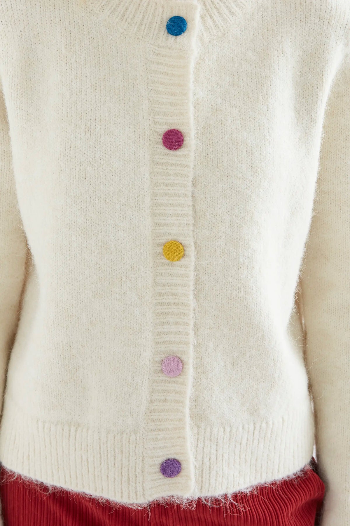 Ecru knit cardigan with multicolored buttons