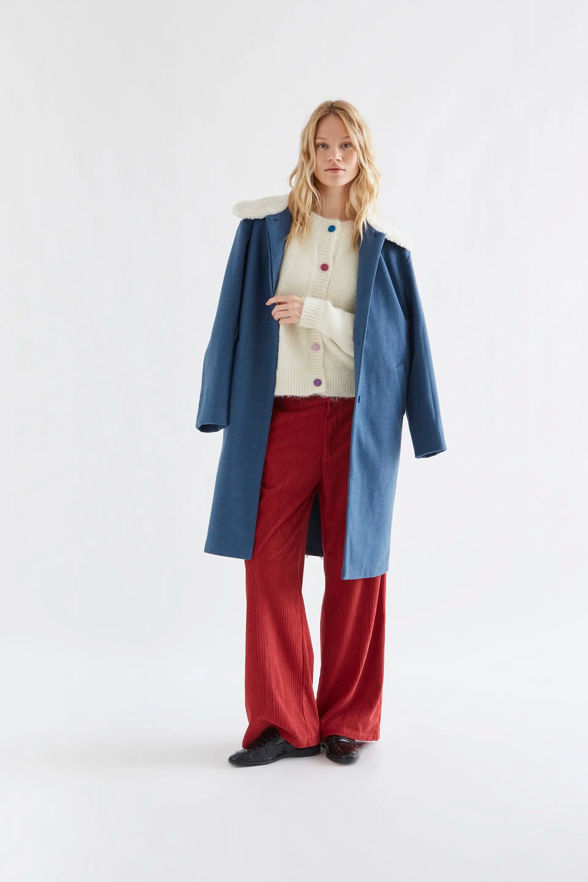 Ecru knit cardigan with multicolored buttons