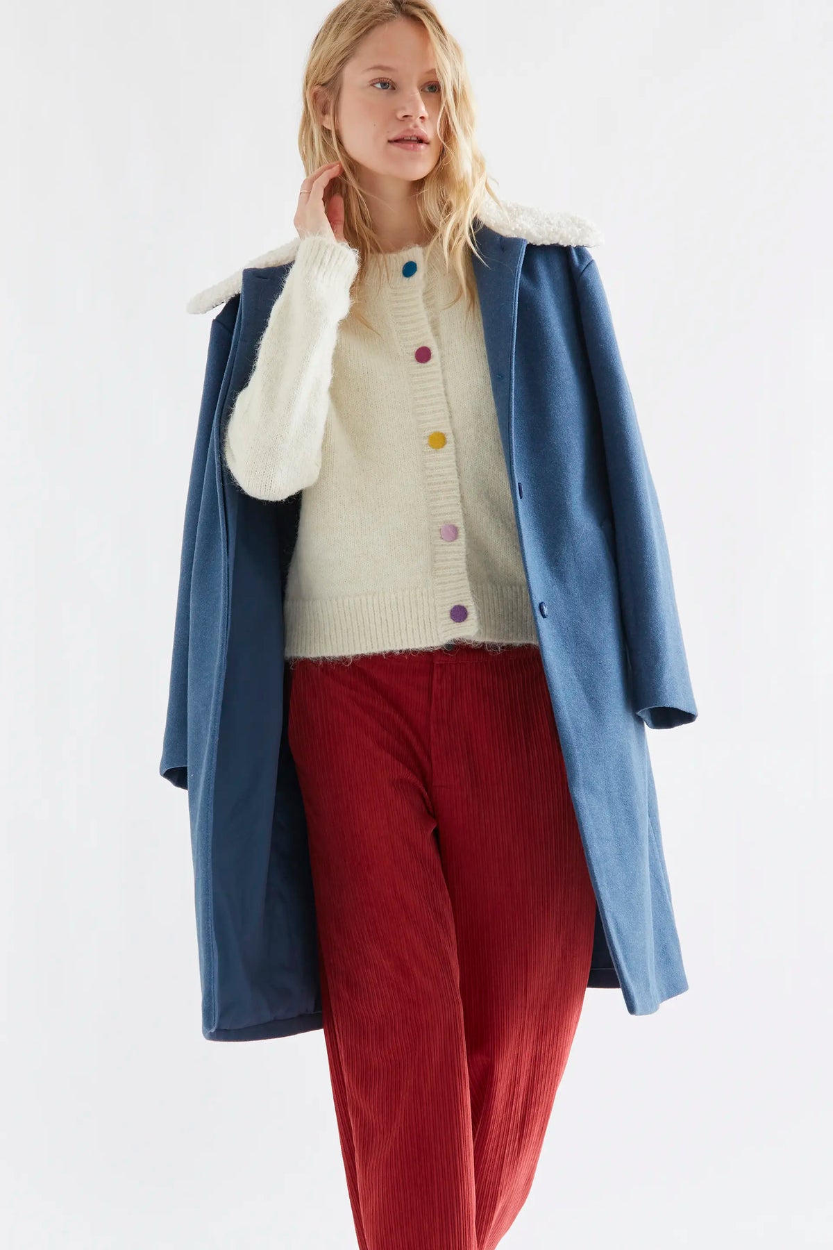 Ecru knit cardigan with multicolored buttons