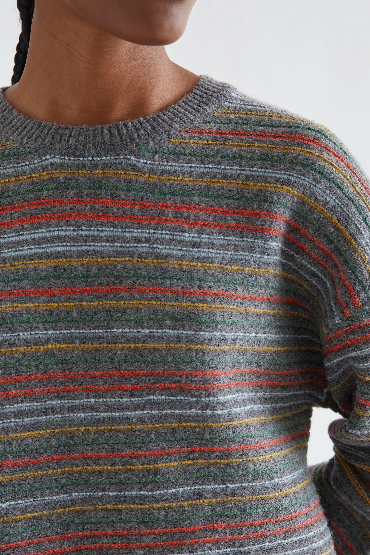 Grey knit sweater with multicolor stripe print