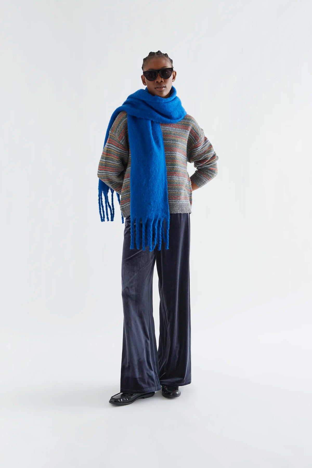 Grey knit sweater with multicolor stripe print