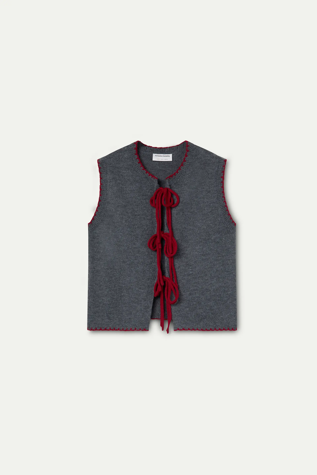 Chaleco punto gris con detalle lazado rojo