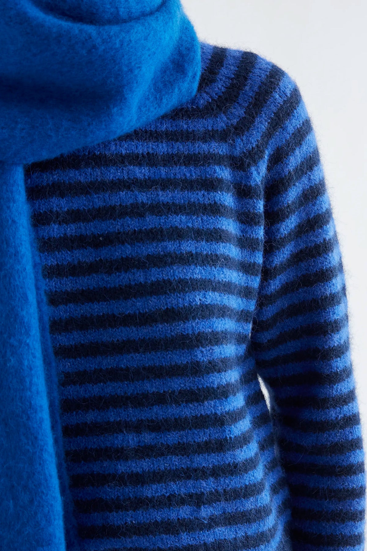 Navy blue and blue striped knit jumper