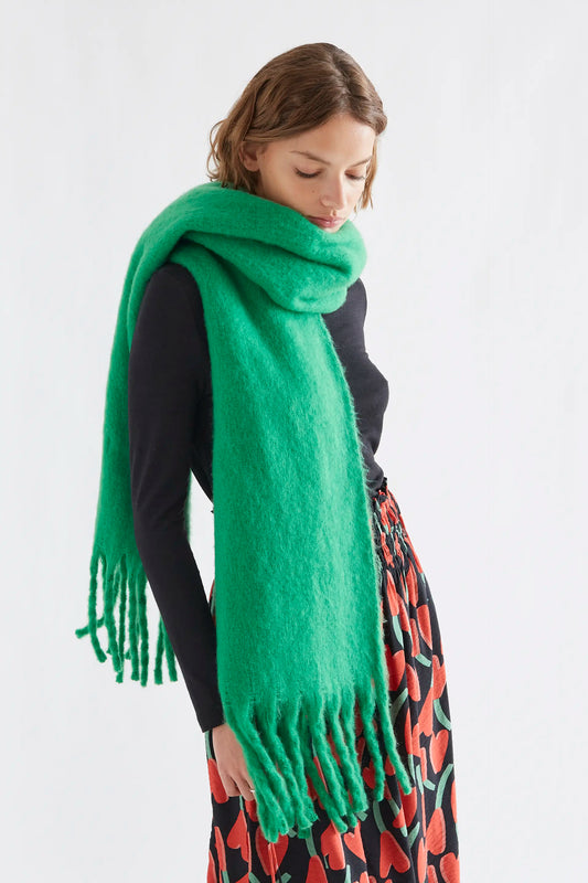 Green knitted scarf with fringes