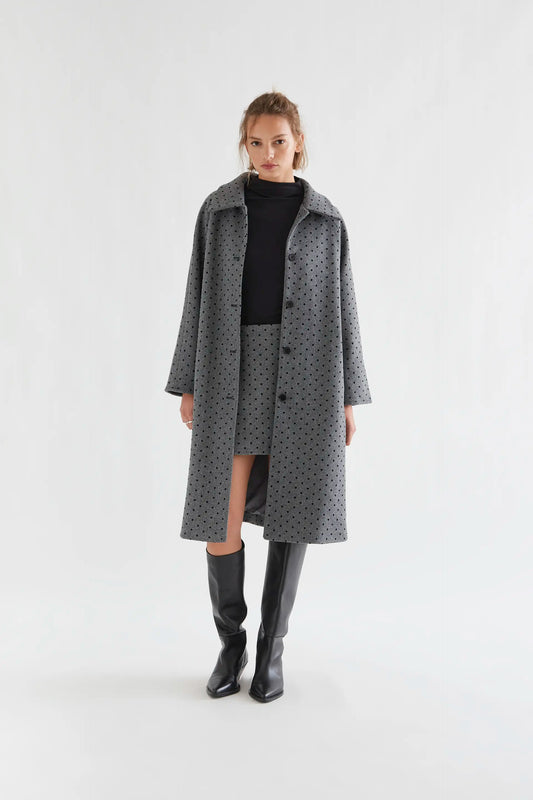 Gray coat with black knit