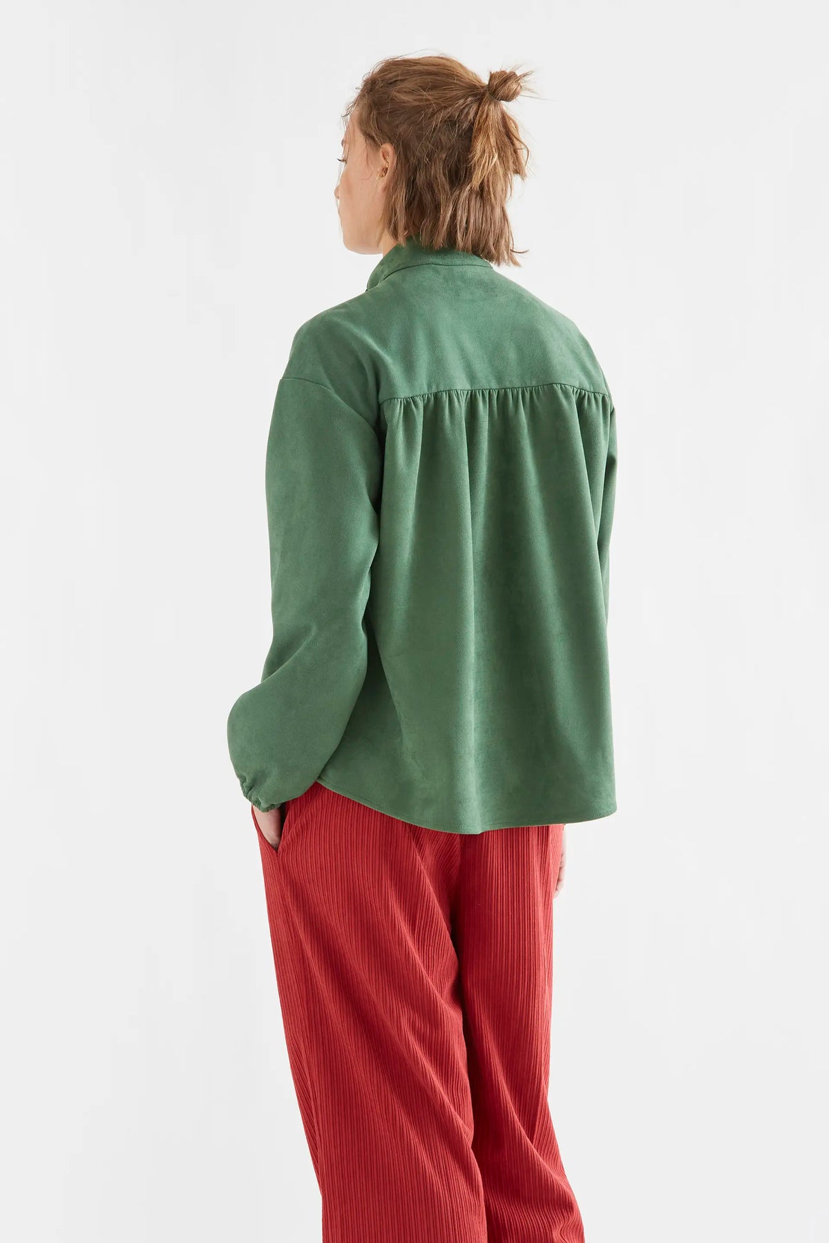 Green suede shirt with maxi bow