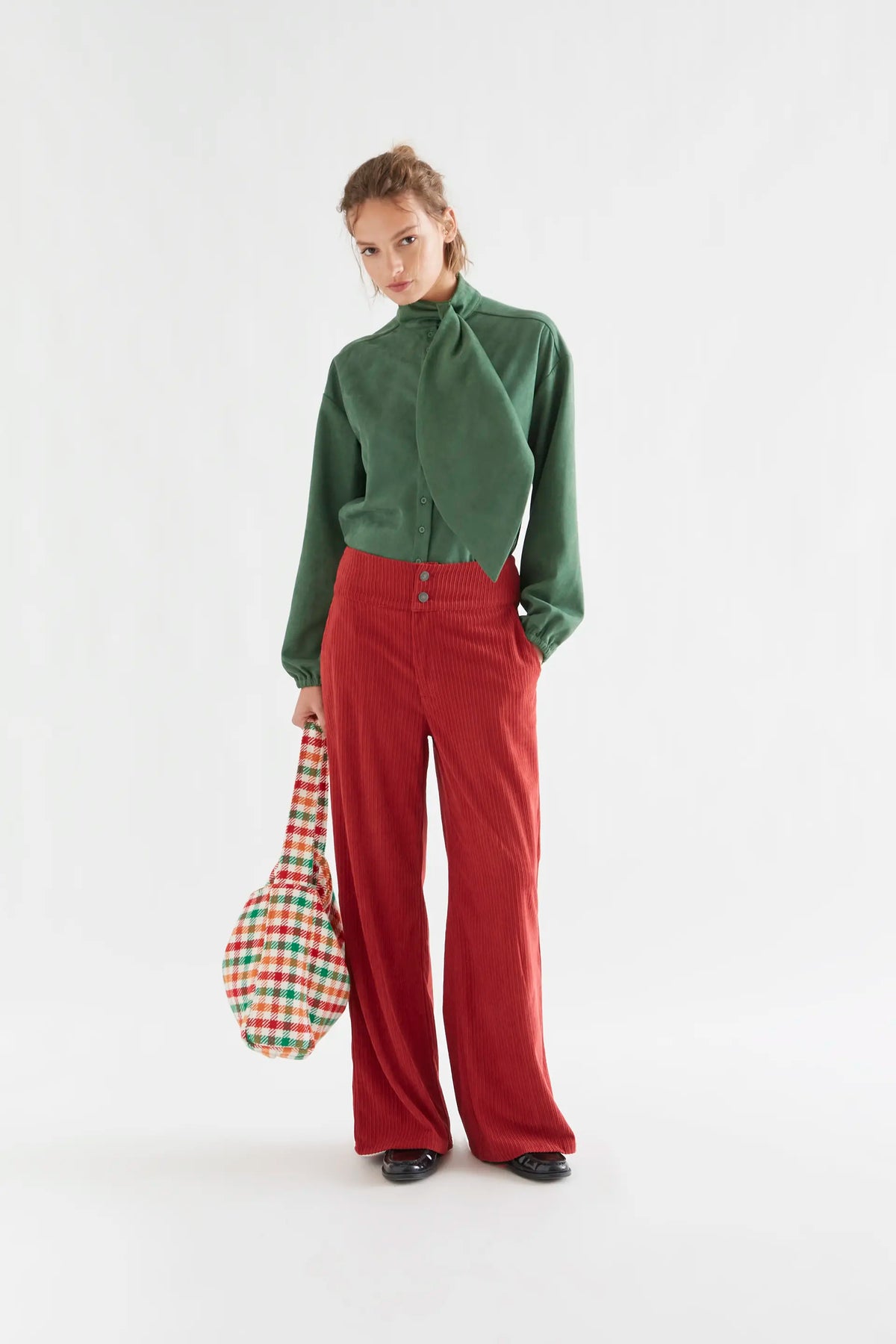 Green suede shirt with maxi bow