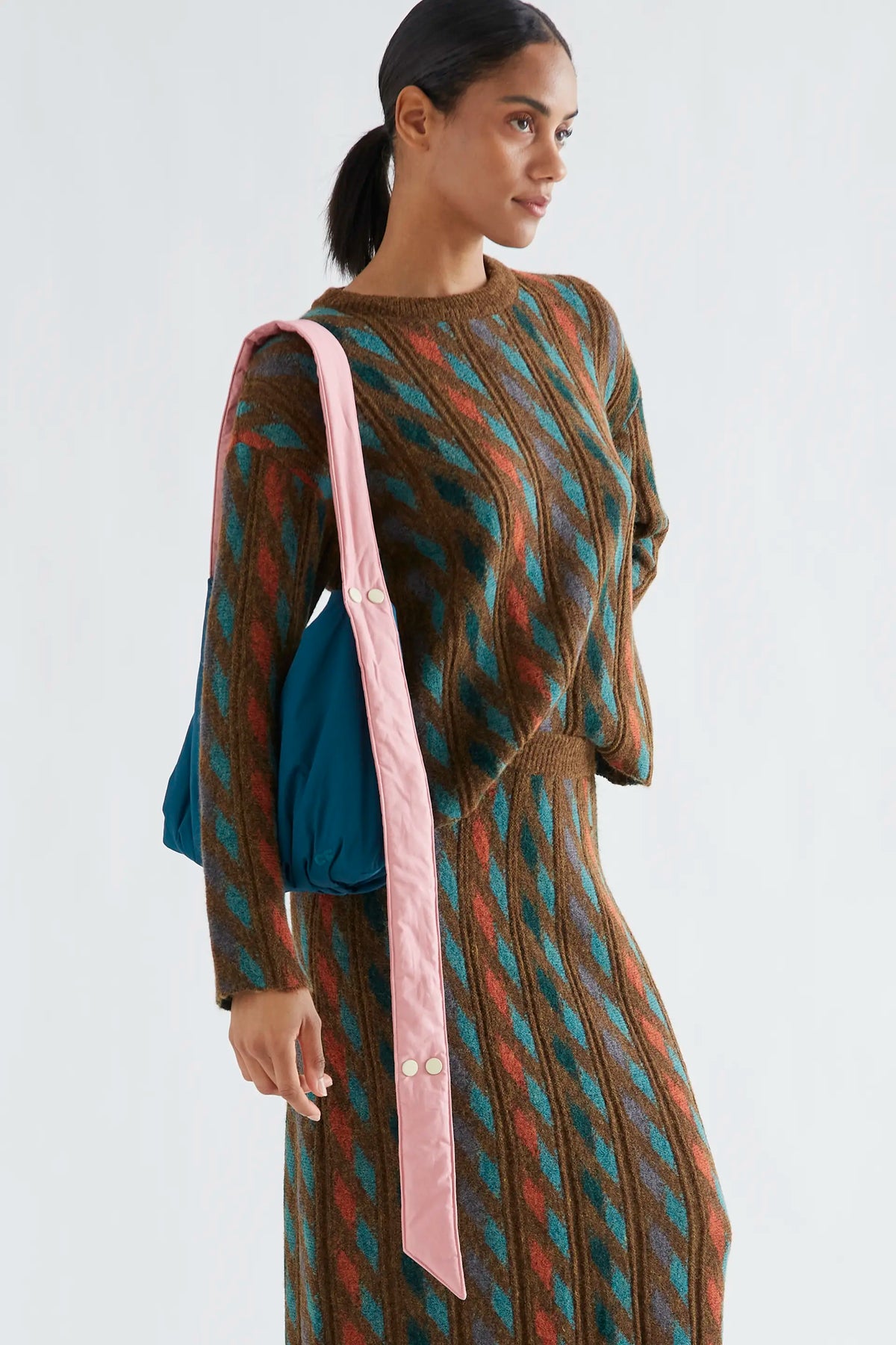 Blue shoulder bag with pink CF logo