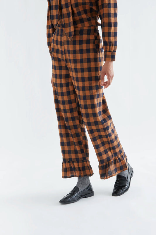 100% cotton pants with a brown and navy plaid pattern