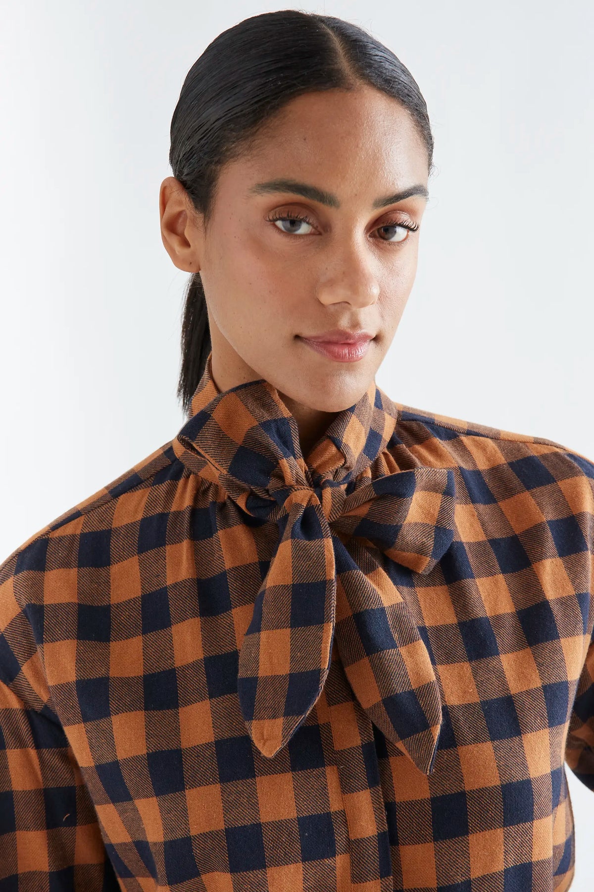 100% cotton lace-up shirt with brown and navy plaid print