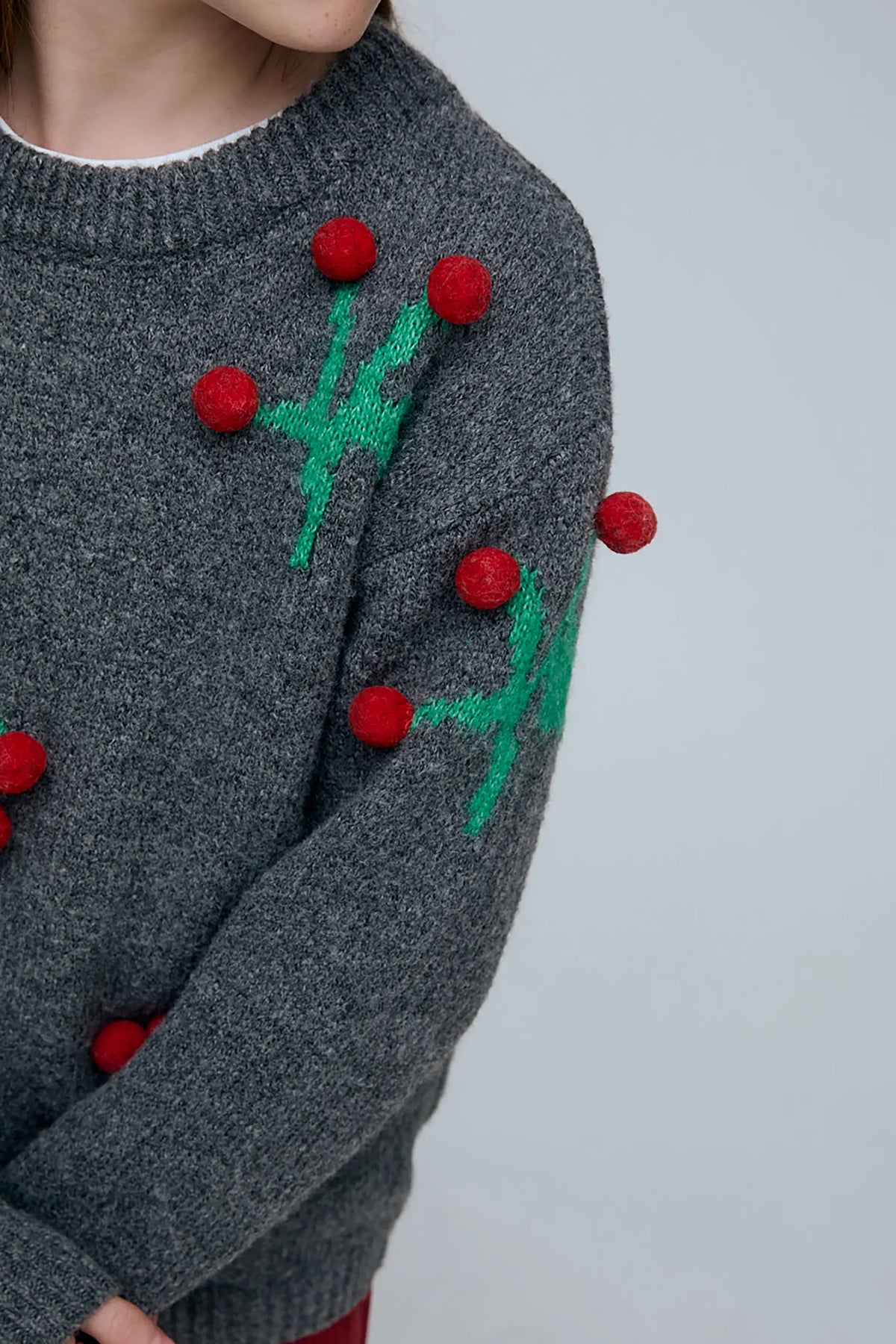 Girls' sweater with Christmas mistletoe detail