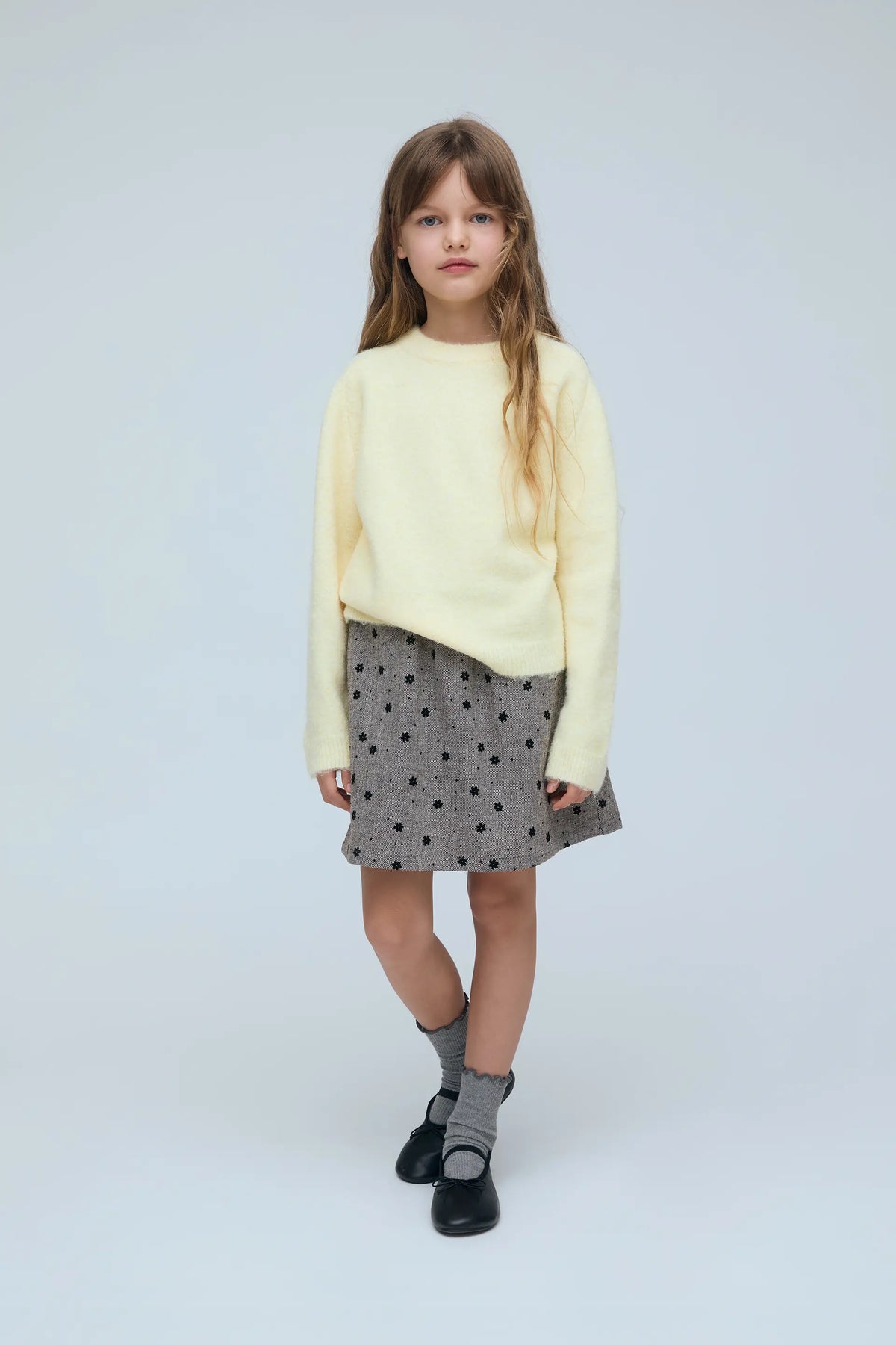 Falda corta tweed de niña con estampado de flores