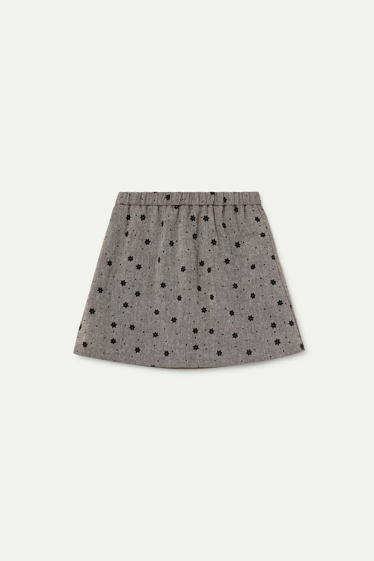 Falda corta tweed de niña con estampado de flores