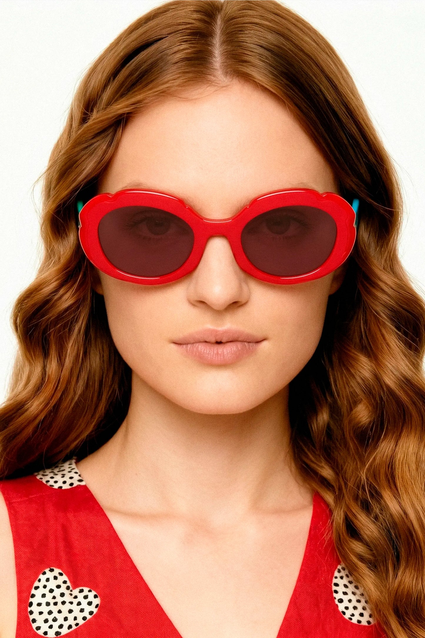 Gafas de sol rojas con punta patillas multicolor azul claro y verde